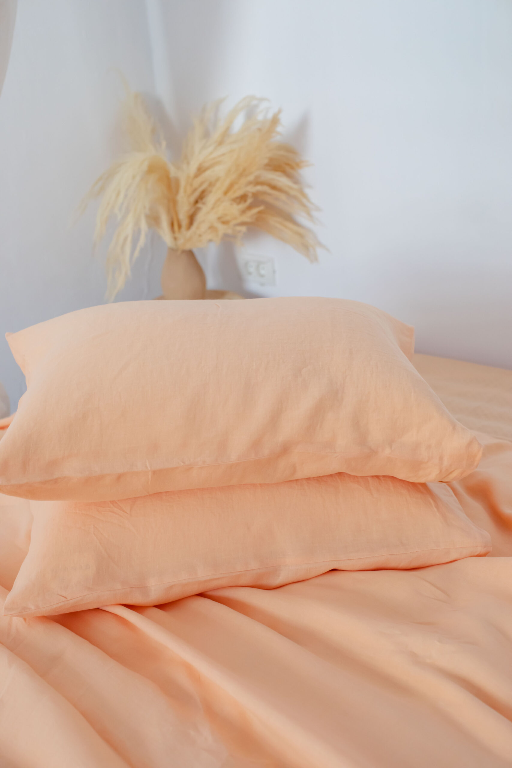 Sæt Peach Bite-pudebetræk 50x60 og lagen 90x200