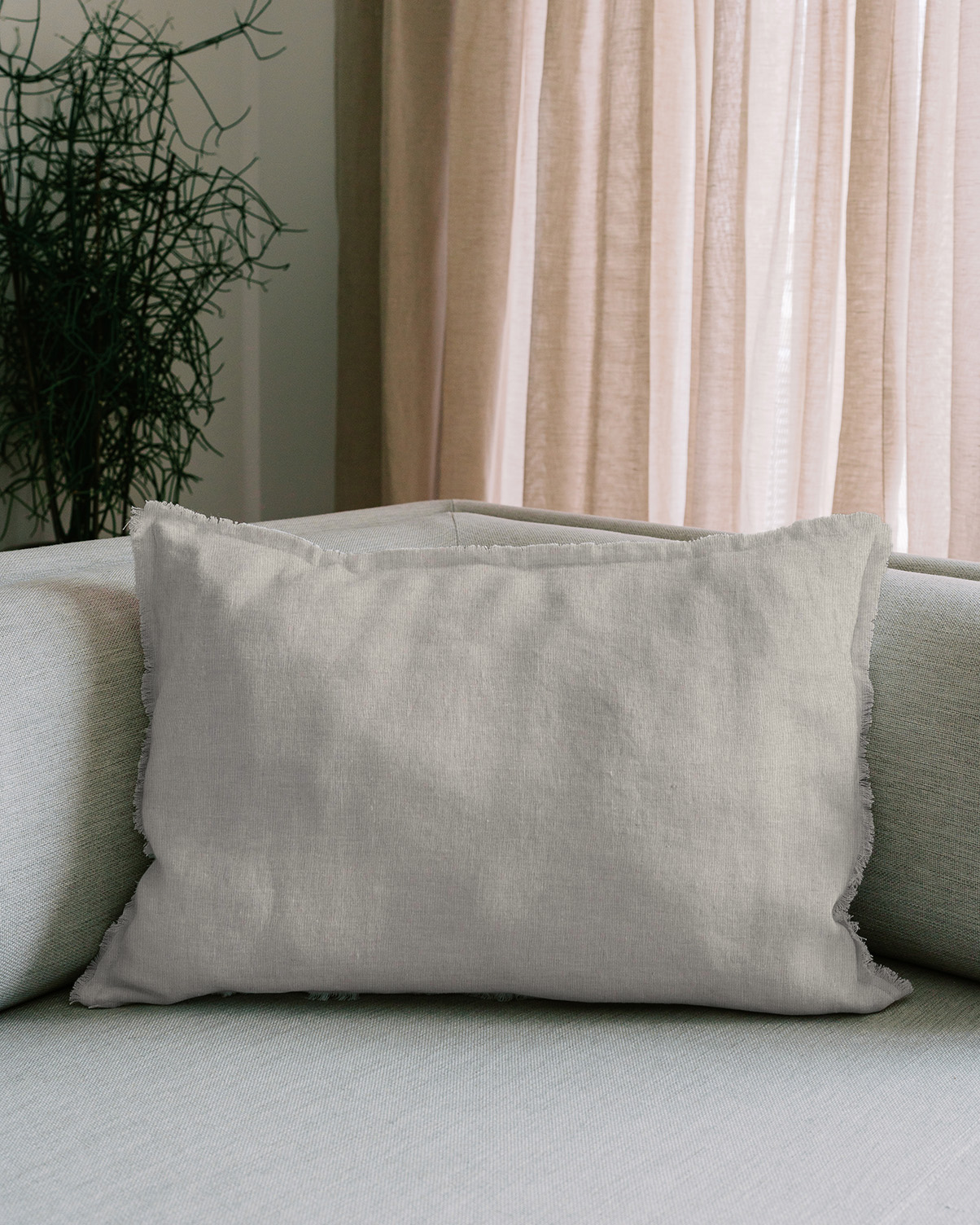 HUG-pude med frynser 50x60